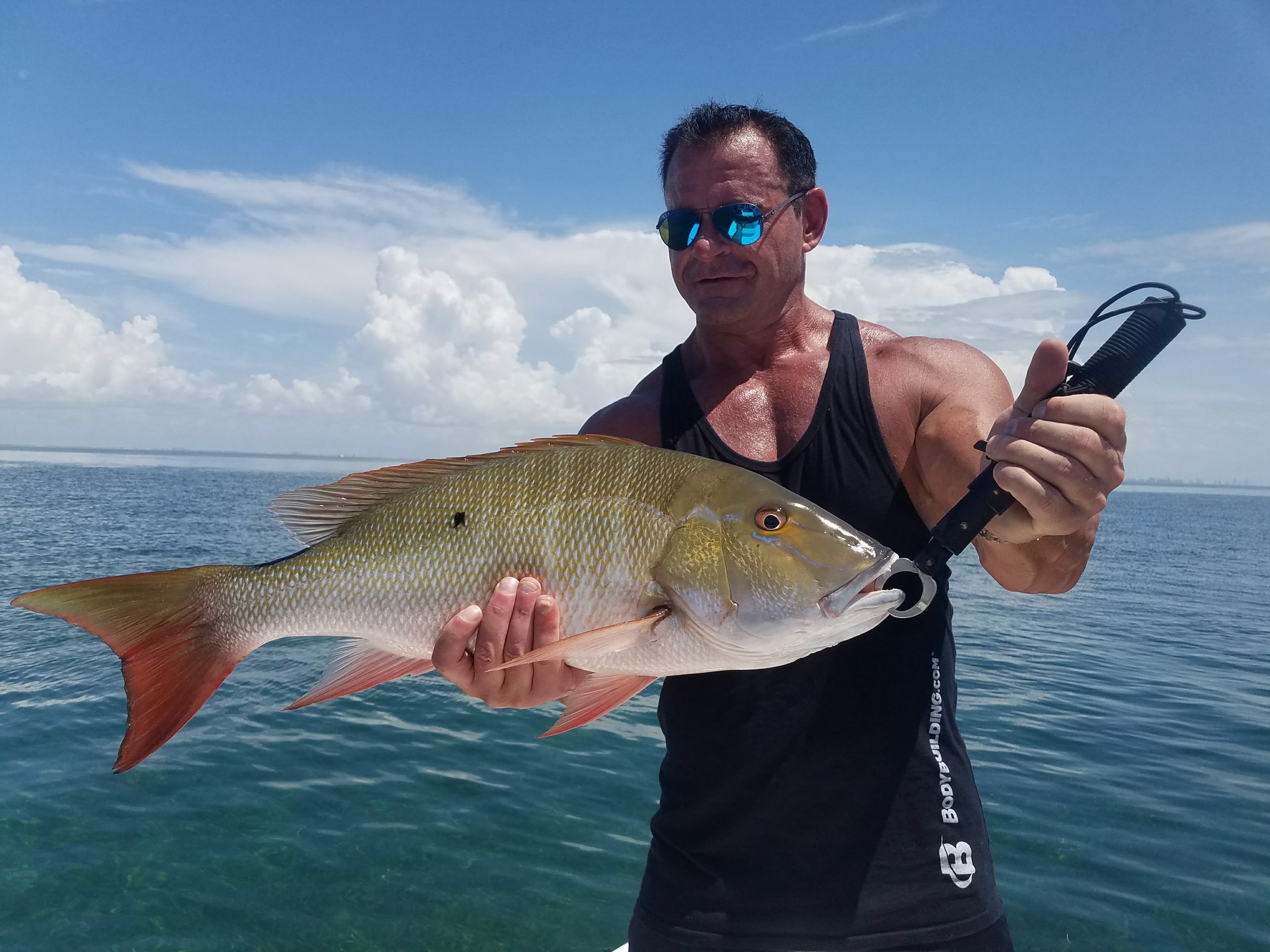 Tarpon jumping during a 6 hour flats fishing charter on Biscayne Bay Miami Florida